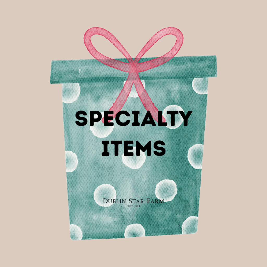 Image is a Dublin Star Farm Specialty Items button.  It is a watercolor rendering of a teal package with white dots and a pink bow. The watercolor image is on a faint orange background with the words "Specialty Items" in bold and the Dublin Star Farm logo watermarked on top of it.   Click here to enter the Specialty Items Menu area.